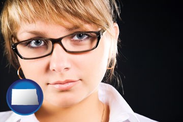 a young woman wearing eyeglasses - with North Dakota icon