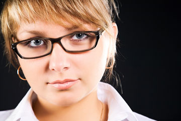 a young woman wearing eyeglasses